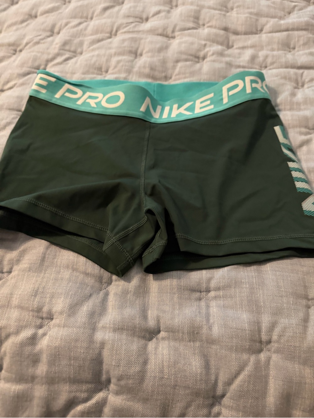 Nike Women's Dark Green Athletic Shorts with Teal Waistband